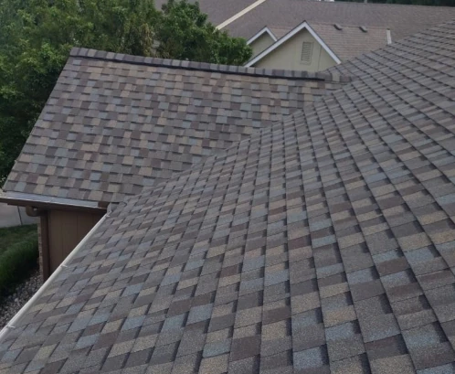 A new asphalt shingle roof installed by Bill West Roofing in Kansas City.