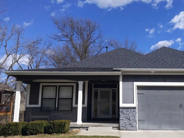 Grey Home With White Trim